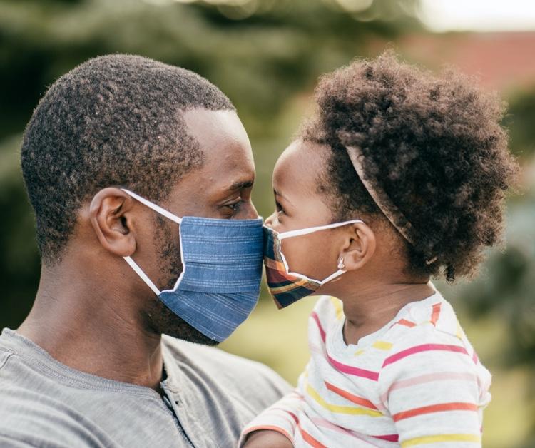 Father and daughter looking into each other's eyes