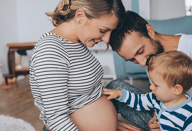 Mom playing with her baby