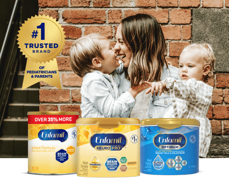 Happy mom with two children with Enfamil product lineup that is #1 Trusted Brand of Pediatricians* and Parents