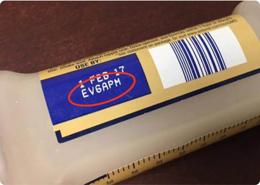The Lot Number is near the Use By/Expiration Date