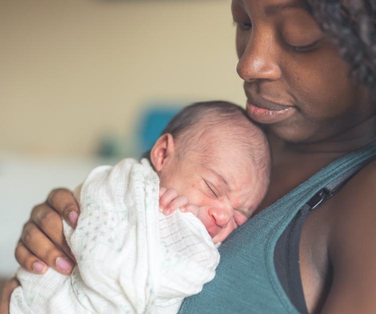 Mom holding her newborn