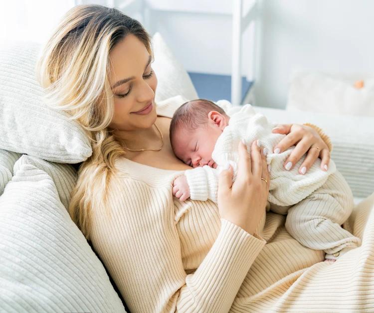Mother holding her baby