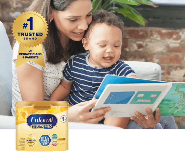 Mom reading a book to her baby