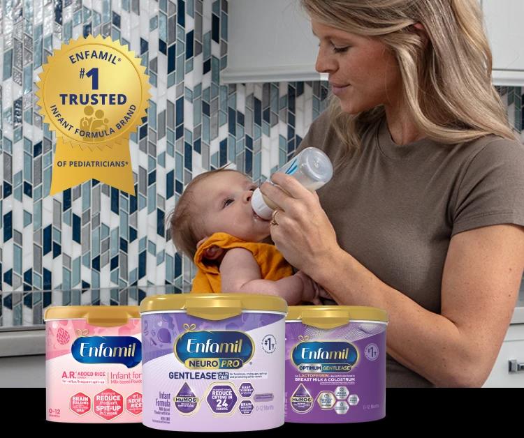 Mom giving a bottle to her baby