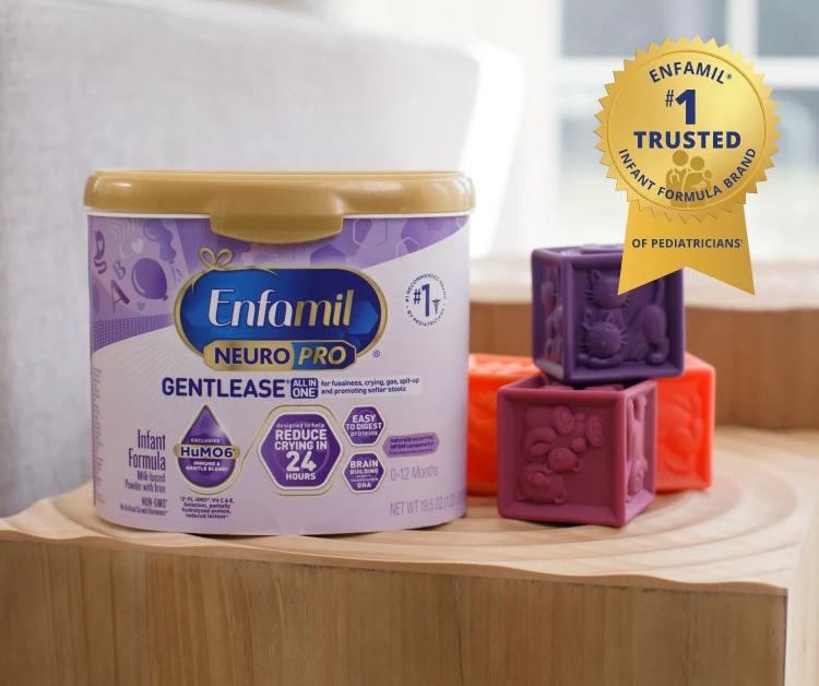 Tub of Enfamil NeuroPro Gentlease sitting next to colorful blocks.