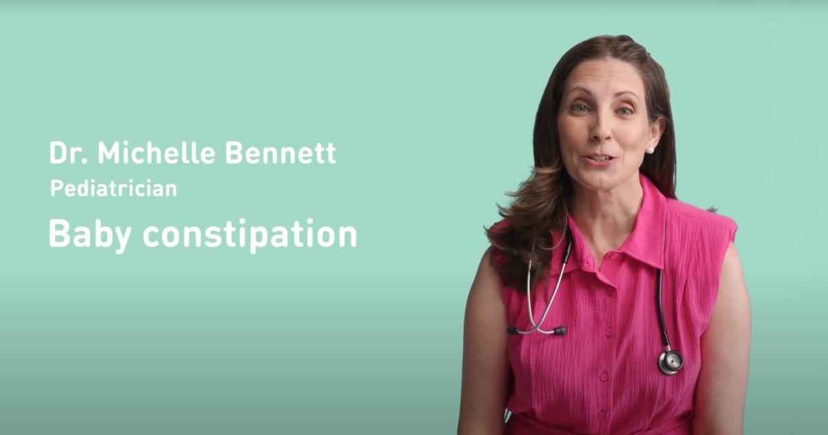 Mom kissing baby's feet