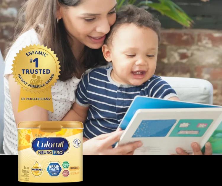 Mom reading a book to her baby