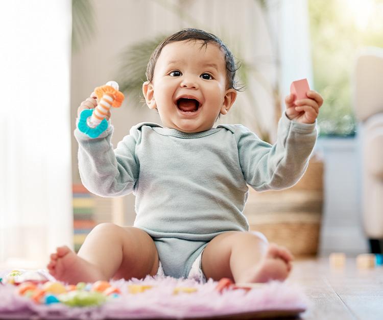 Baby crawling and smiling at dad